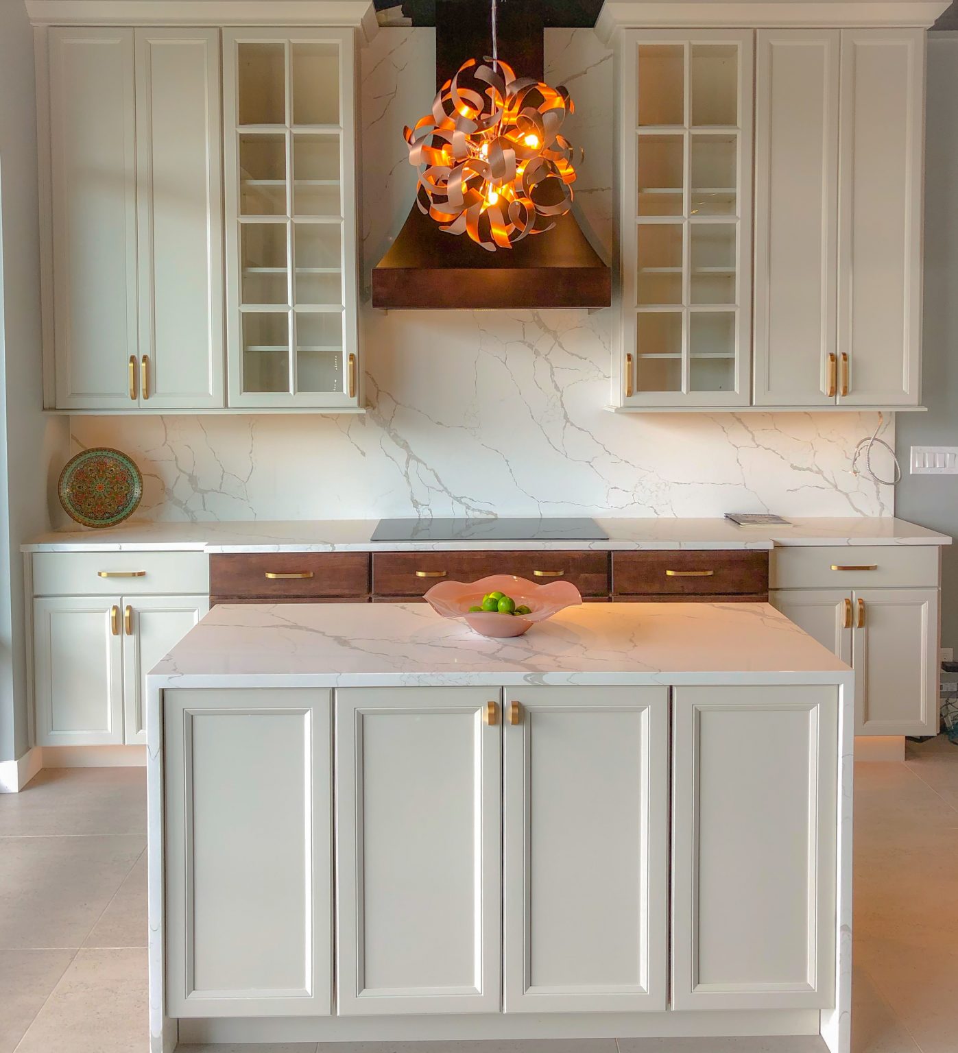 waterfall edge countertop on white cabinets