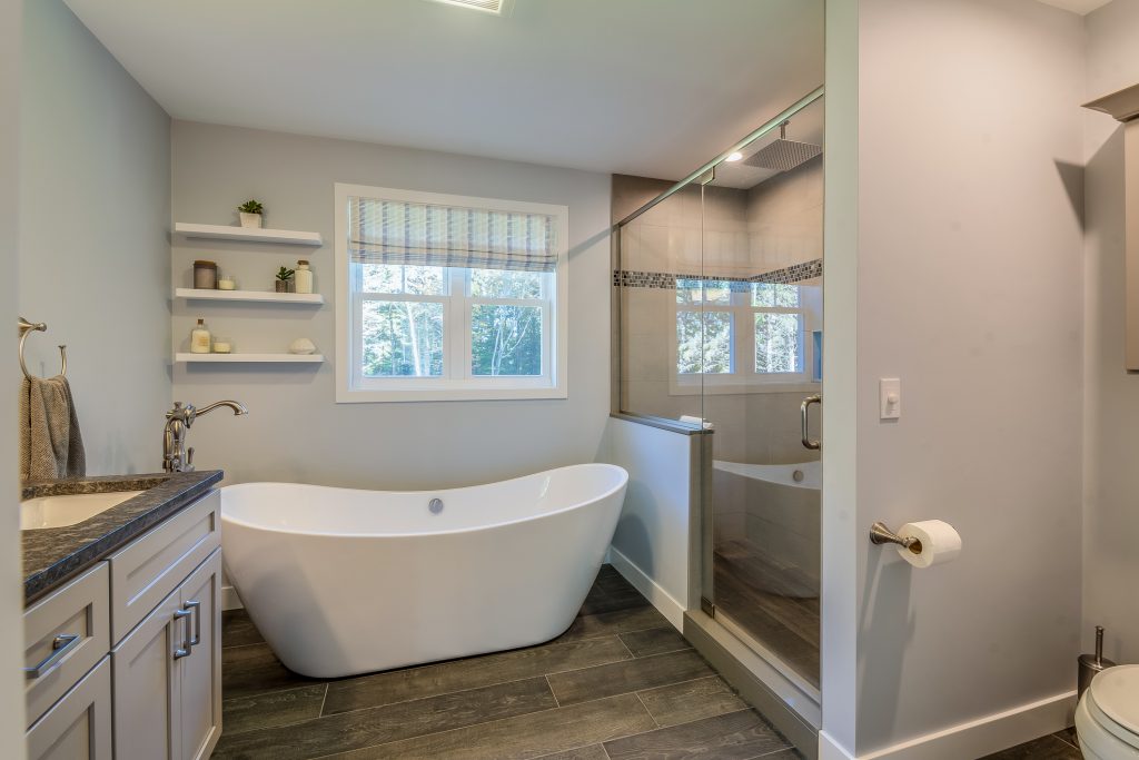 Large free standing bathtub in new bathroom