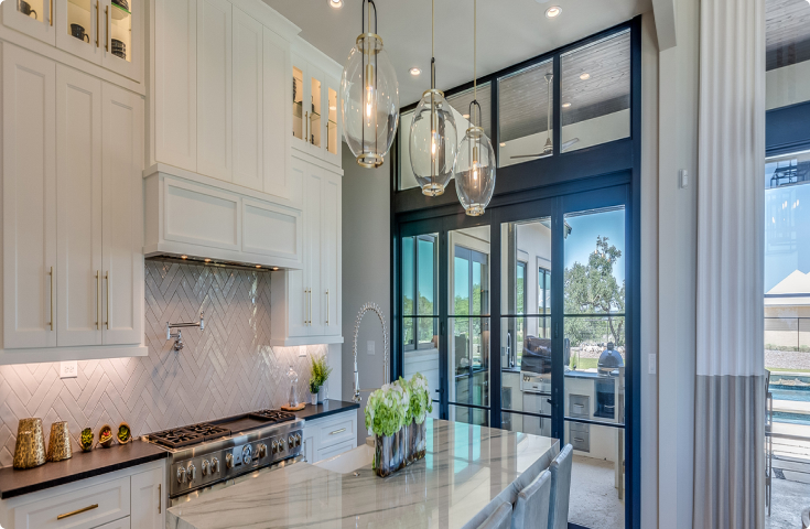 modern kitchen with stainless steel appliances and granite countertops