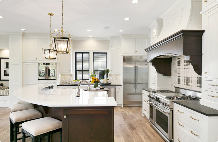 modern kitchen with stainless steel appliances and porcelain countertops